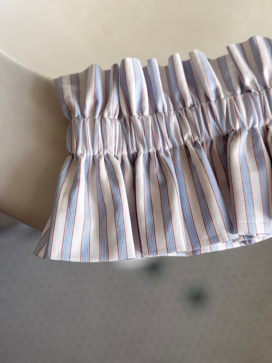 Col rayé bleu et brun